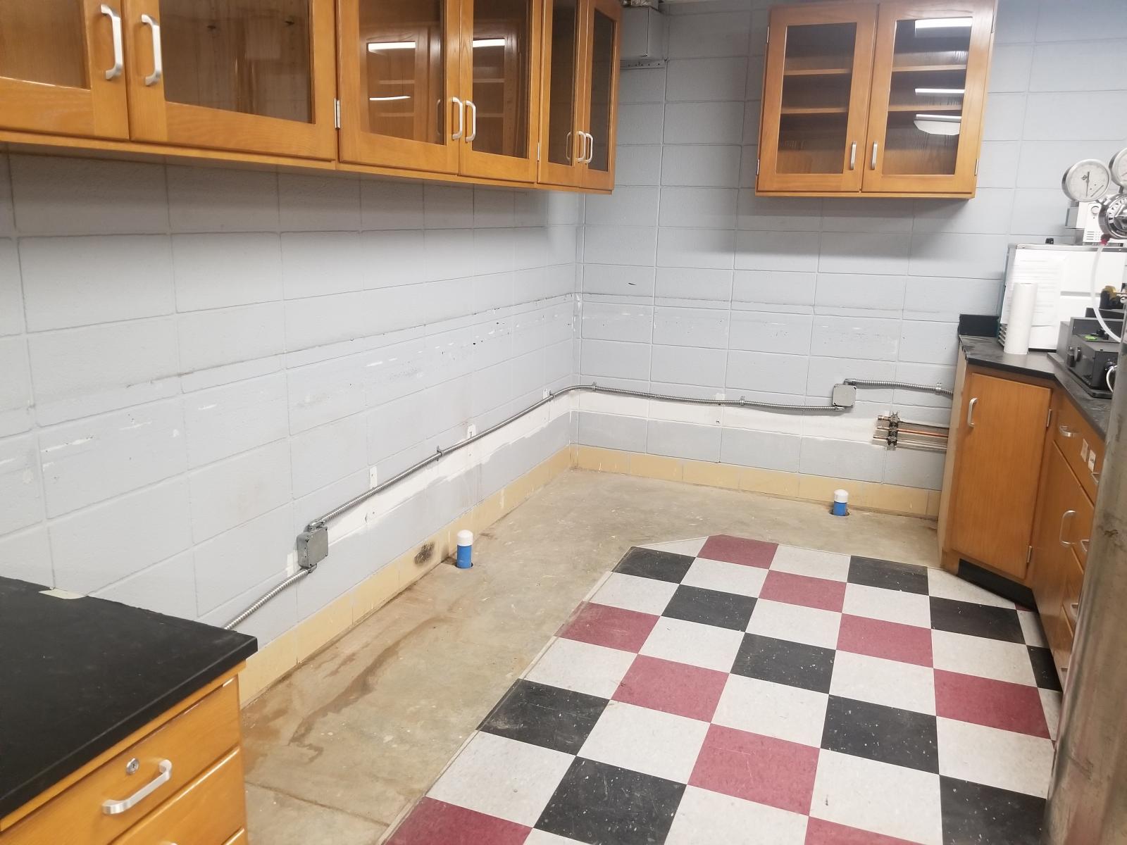 Removed plumbing and rerouted electrical.