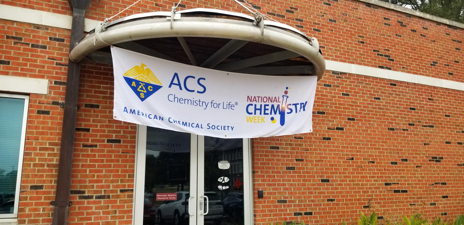 Hanging up banners for National Chemistry Week 2023
