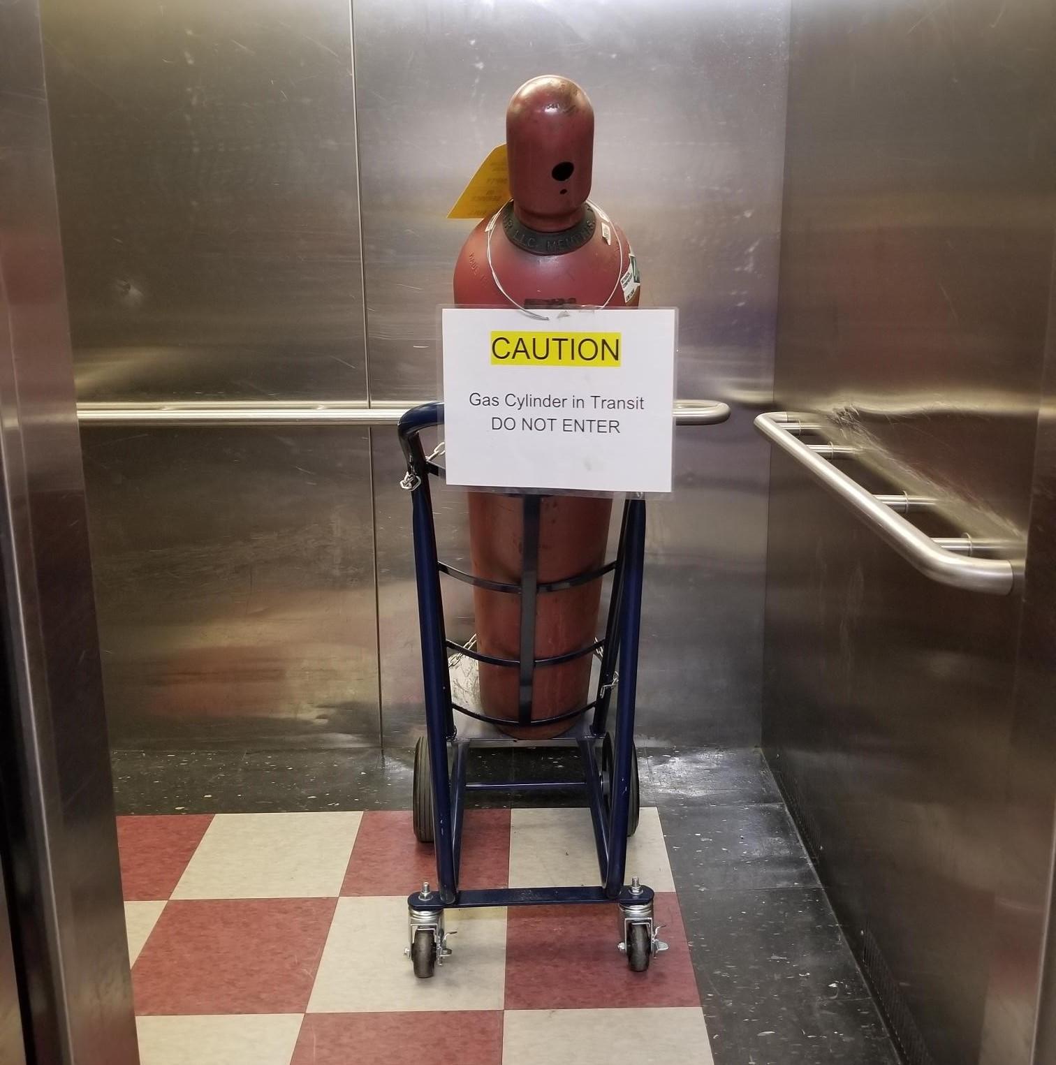 Gas cylinders on elevators